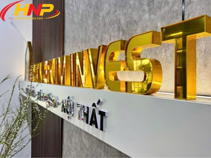 backdrop logo inox vàng